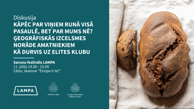 Maizes klaips uz balta auduma